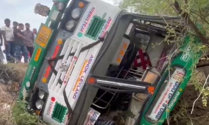 60 Escape as APSRTC Bus Overturns in Kondapi