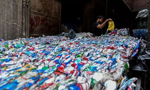 Egypts Garbage City Recyclers Reap Gains From Iran War Plastic Squeeze Egypts Garbage City Recyclers Reap Gains From Iran War Plastic Squeeze