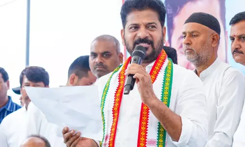Modi, Pradhan Colluded To Loot India, Says Revanth