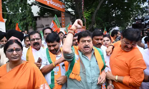 Tension in Nampally as BJP, Congress Protests Turn Confrontational Tension in Nampally as BJP, Congress Protests Turn Confrontational
