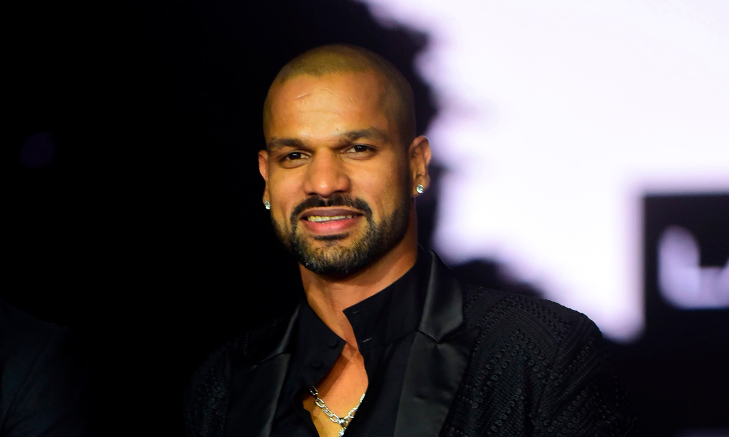 Dhawan Urges Patience Amid NEET Protests