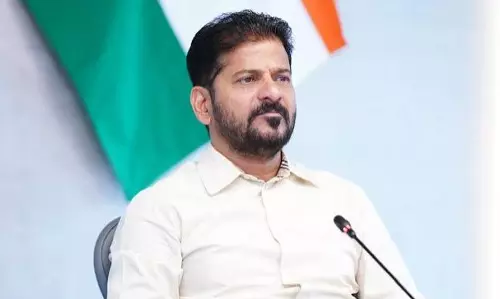 Revanth Reddy Attacks Modi After Dharmendra Pradhans Resignation