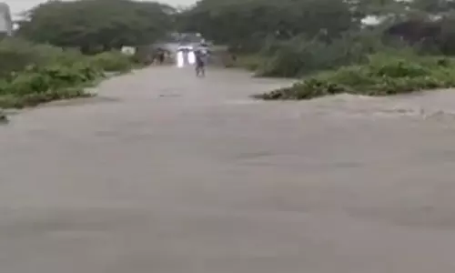 Heavy Rains Wash Away Neredla Dharmapuri Road in Jagtial Heavy Rains Wash Away Neredla Dharmapuri Road in Jagtial
