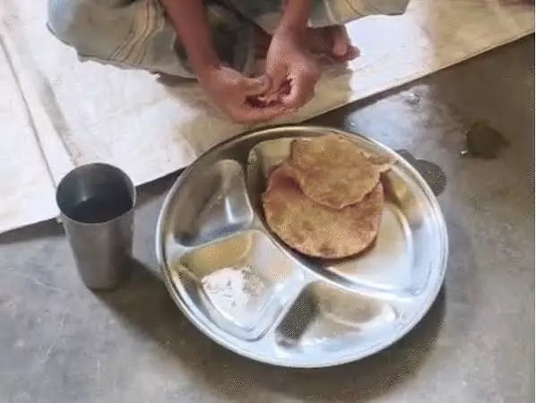 MP: Viral Video Shows Anganwadi Centre Serving ‘Puri and Salt’ as Nutritious Food to Children MP: Viral Video Shows Anganwadi Centre Serving ‘Puri and Salt’ as Nutritious Food to Children