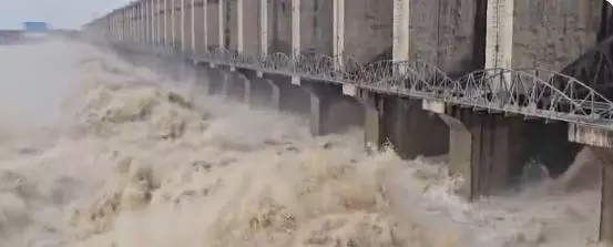 Heavy Inflows Prompt Opening of 29 Gates at Jurala Project Heavy Inflows Prompt Opening of 29 Gates at Jurala Project