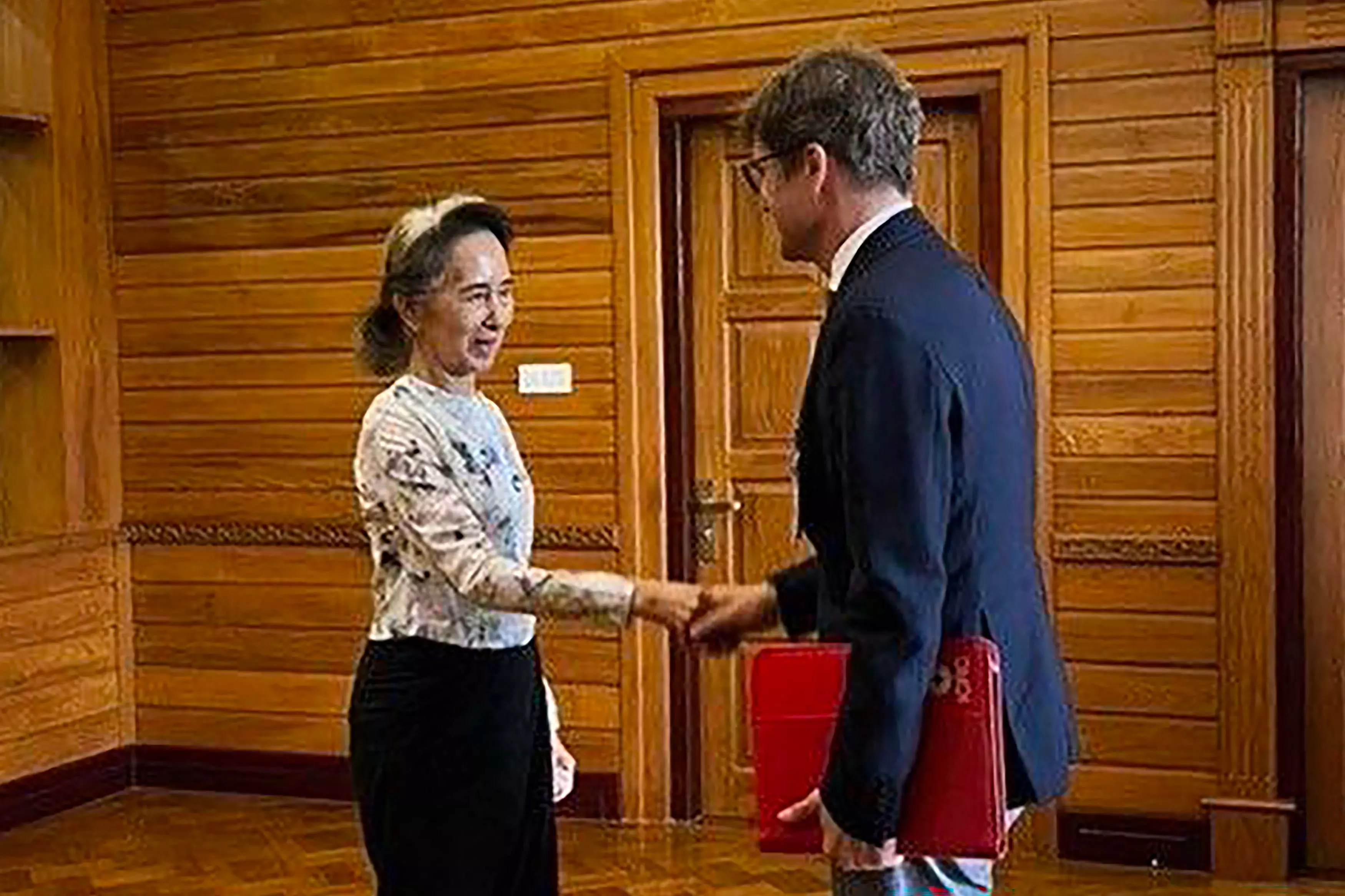 Detained Aung San Suu Kyi Meets Red Cross Delegate in Myanmar Detained Aung San Suu Kyi Meets Red Cross Delegate in Myanmar