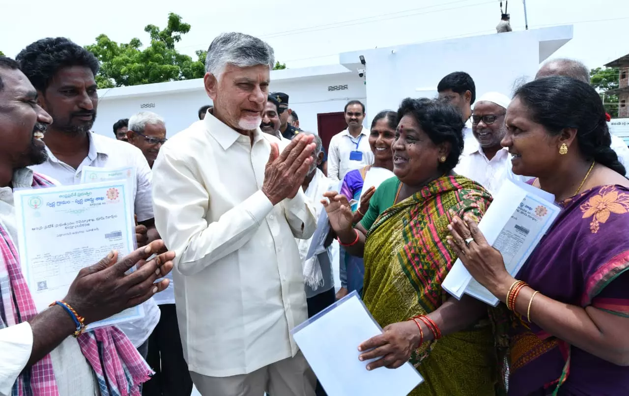 CM Naidu Interacts With Villagers, Orders Removal of 4,977 Acres of Land From Section 22-A in Eluru District CM Naidu Interacts With Villagers, Orders Removal of 4,977 Acres of Land From Section 22-A in Eluru District