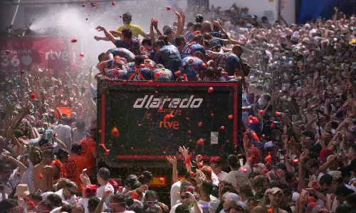The Epic La Tomatina Food Fight Draws Thousands To Spanish Town