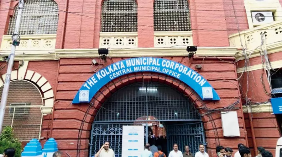 KMC, Cops Remove TMC Signboard From Abhisheks Office Amidst Fight KMC, Cops Remove TMC Signboard From Abhisheks Office Amidst Fight