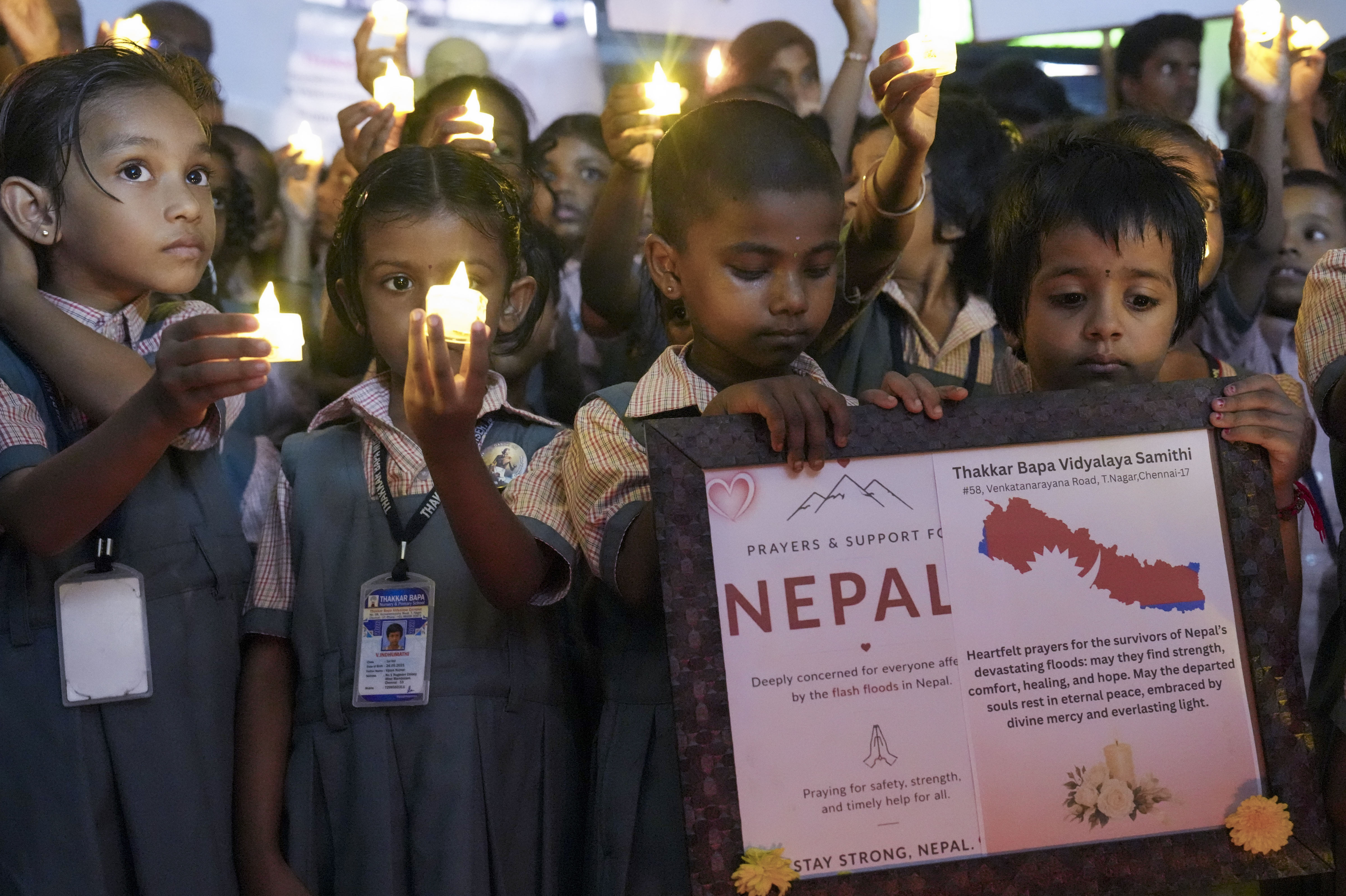 Tearful Embraces, Prayers as Nepal Flood Survivors