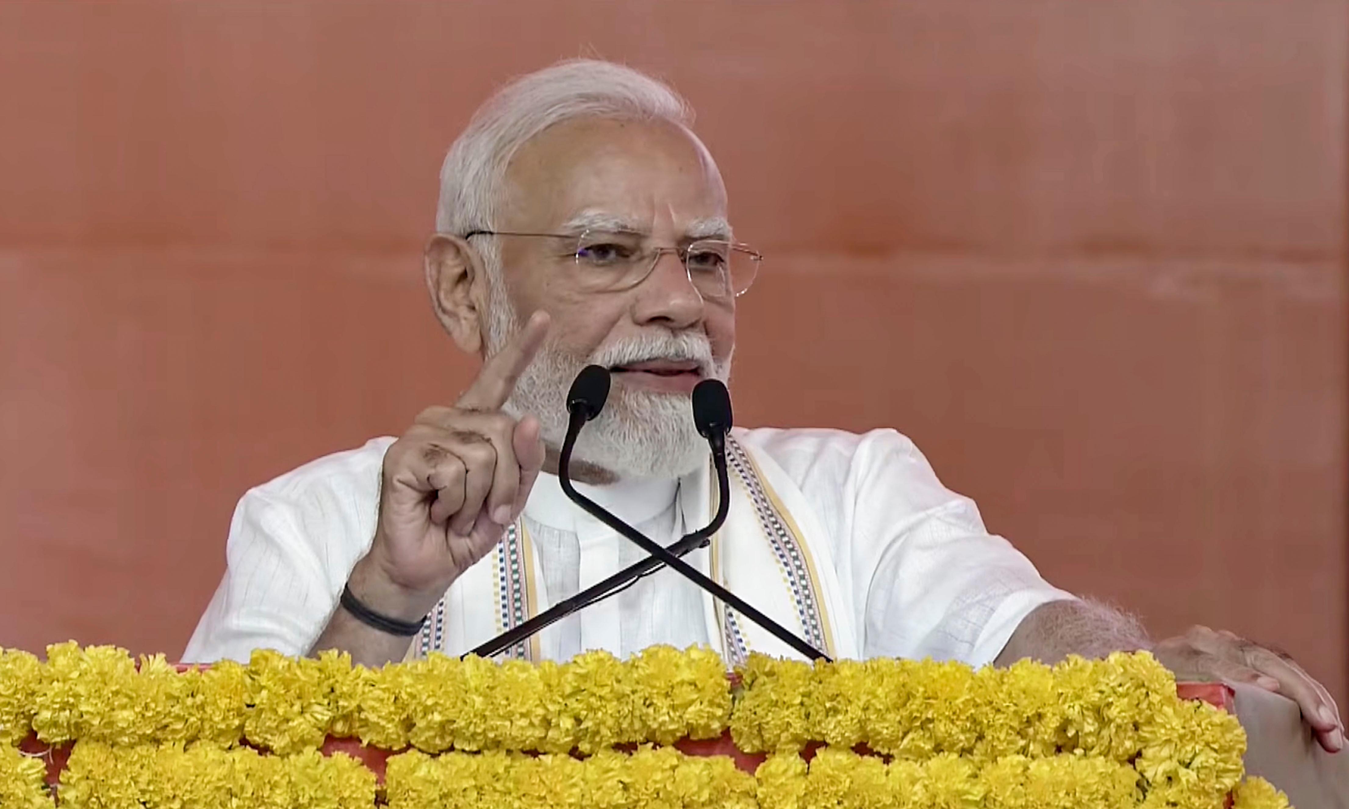 PM Modi Calls BJP Offices โShelter for Distressedโ at Navsari Rally