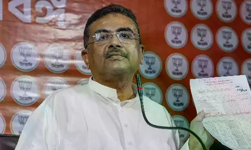 Suvendu Eats Fish At Kali Temple, BJP Says Non-Veg Row Over Suvendu Eats Fish At Kali Temple, BJP Says Non-Veg Row Over
