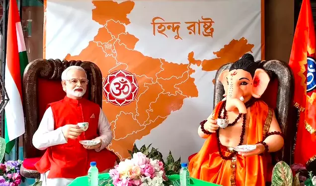 Howrah Ganesh Puja Pandal Features Modi Drinking Tea With Lord Ganesha Howrah Ganesh Puja Pandal Features Modi Drinking Tea With Lord Ganesha
