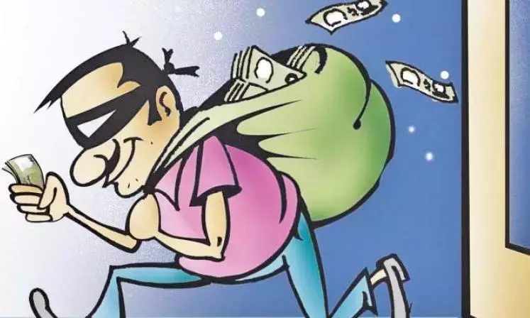 Burglars Steal ₹15 Lakh From Two SBI ATMs In Karimnagar Burglars Steal ₹15 Lakh From Two SBI ATMs In Karimnagar