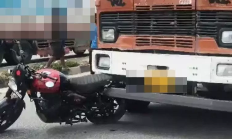 Two Killed On Spot After Lorry Hits Motorcycle In Kakinada Two Killed On Spot After Lorry Hits Motorcycle In Kakinada