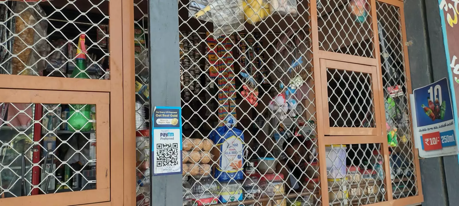 Monkey menace: Iron grills put to protect food items in Kirana stores Monkey menace: Iron grills put to protect food items in Kirana stores