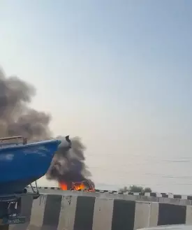 Four Killed As Electric Car Catches Fire On Vijayawada West Bypass Four Killed As Electric Car Catches Fire On Vijayawada West Bypass