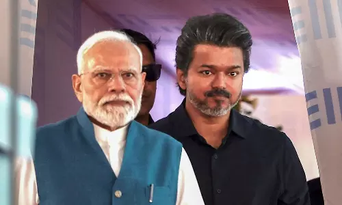 Vijay Stays by PM’s Side Through City Engagements
