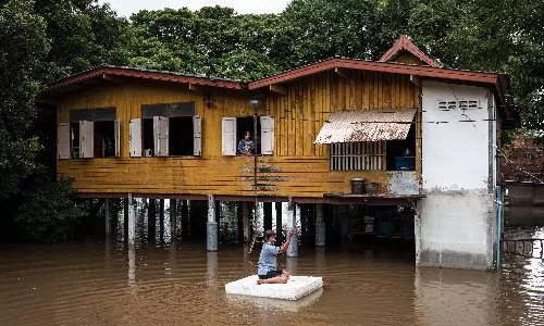 Thailand’s Villages Deliberately Flooded to Shield Capital from Rising Waters Thailand’s Villages Deliberately Flooded to Shield Capital from Rising Waters
