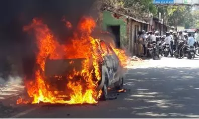 4 Escapes Unhurt as Car Catches Fire near Ghatkesar