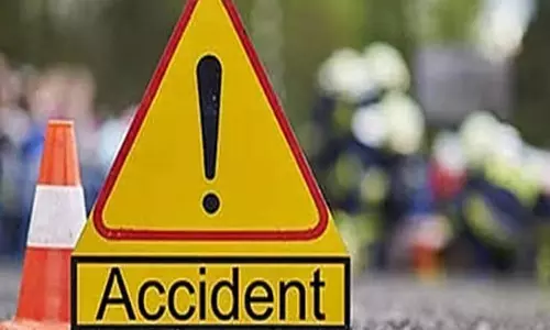 Two Killed as Speeding Car Rams Lorry in Huzurabad Two Killed as Speeding Car Rams Lorry in Huzurabad
