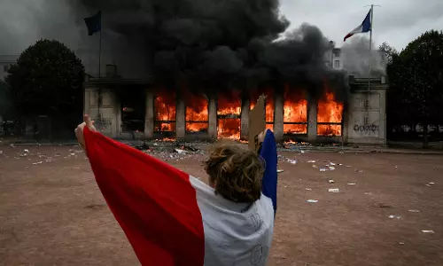 Macron Urges Calm as France Counts Cost of Worst Unrest in Years Macron Urges Calm as France Counts Cost of Worst Unrest in Years