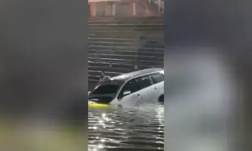 Car Plunges Into Temple Tank At Maheshwaram, Driver Escapes Unhurt Car Plunges Into Temple Tank At Maheshwaram, Driver Escapes Unhurt