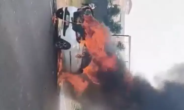 Khammam: Moving Car Catches Fire Near Collectorate, Vehicle Gutted Khammam: Moving Car Catches Fire Near Collectorate, Vehicle Gutted