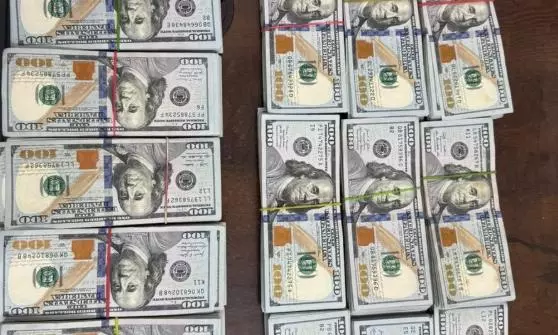 Two Held at RGIA with Rs.1.56 Crore Foreign Currency in Plastic Covers Two Held at RGIA with Rs.1.56 Crore Foreign Currency in Plastic Covers