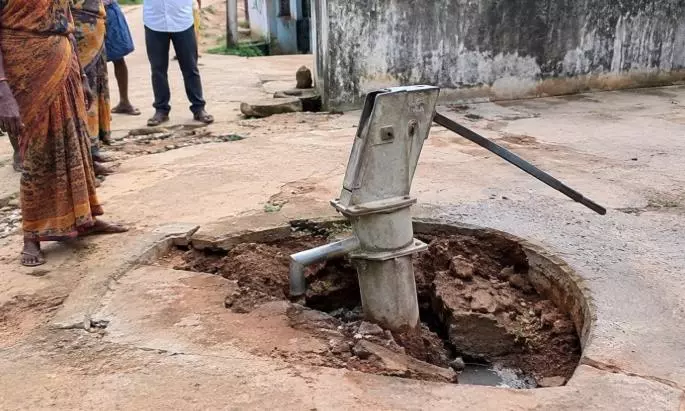 Hand Pump Sinks, Causing Concern In Singareni-Affected Village Hand Pump Sinks, Causing Concern In Singareni-Affected Village