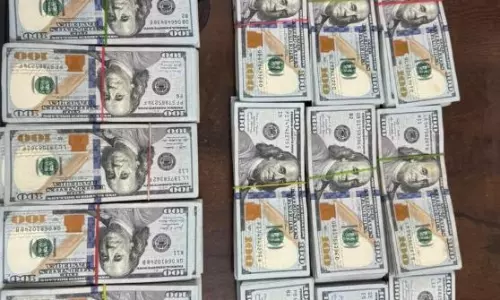 Two Held at RGIA with Rs.1.56 Crore Foreign Currency in Plastic Covers Two Held at RGIA with Rs.1.56 Crore Foreign Currency in Plastic Covers