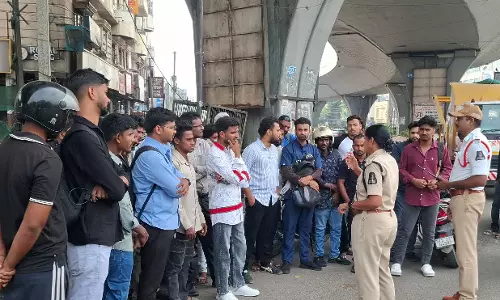 Hyderabad Traffic Police Book 40 Motorists for Using Phones while Driving