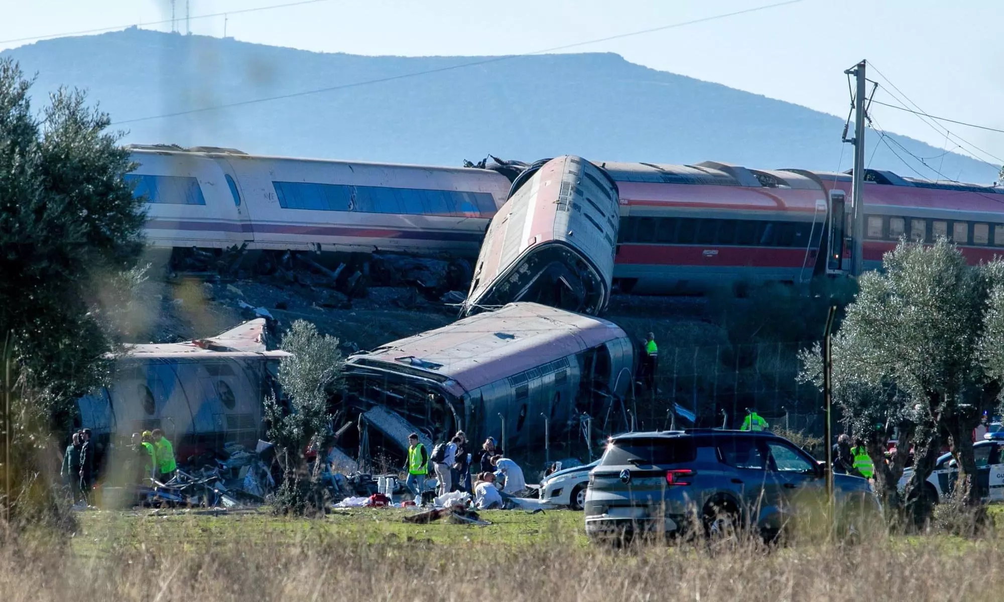 Spain Train Crash: High-Speed Train Hits Stopped Train, Killing at Least 10 Spain Train Crash: High-Speed Train Hits Stopped Train, Killing at Least 10