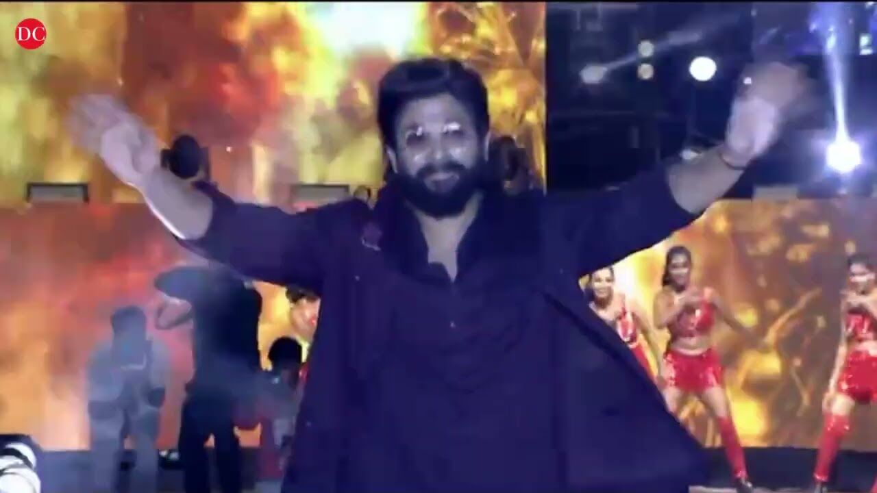 Icon Star Allu Arjuns swag as he enters stage at pushpa2 promotional event in Hyderabad